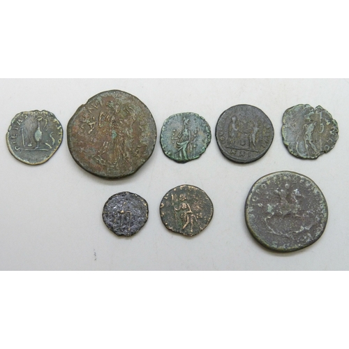 7286 - A collection of bronze coins including Roman