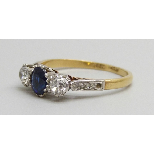 7137 - An 18ct gold and platinum set sapphire and diamond ring, 2.4g, M