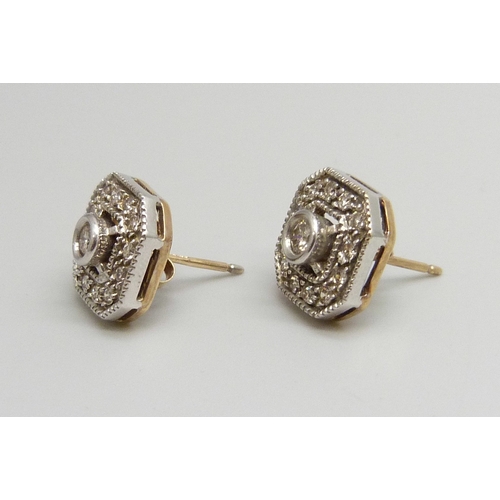 7140 - A pair of 9ct gold diamond set earrings, 4.7g, 1.1cm