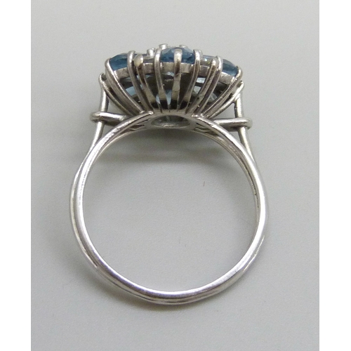 7146 - A white metal, diamond and possibly aquamarine cluster ring, 4.9g, O