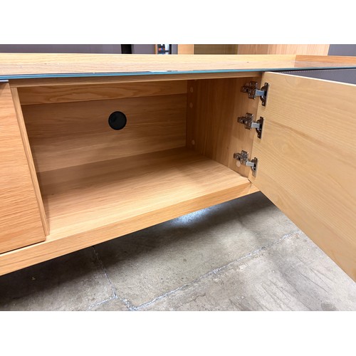3001 - A Hobang oak large Television unit with glass top