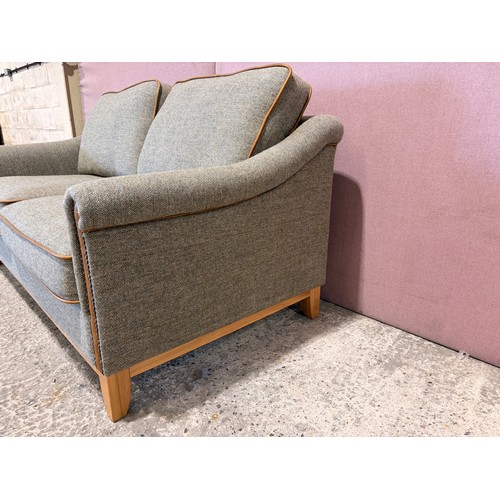3007 - A Whinfell lowland thistle fabric and leather piping 2 seater sofa  (XWHIN02) (CFD-316-12)