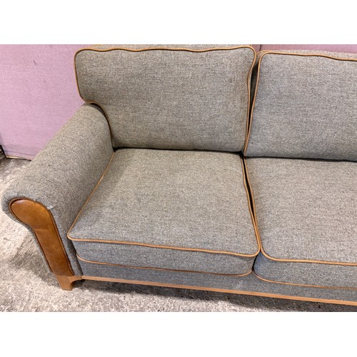 3008 - A Whitwell thistle fabric and tan leather 2 seater sofa (CRES2) (CFD-316-2)