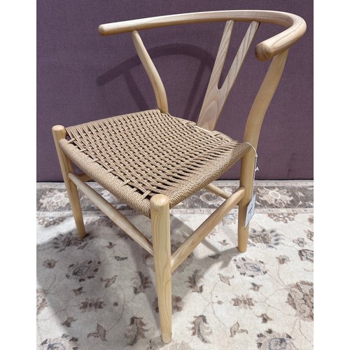 3020 - A Hotcot rattan wishbone chair with weave rope seat (CFL-316-82)