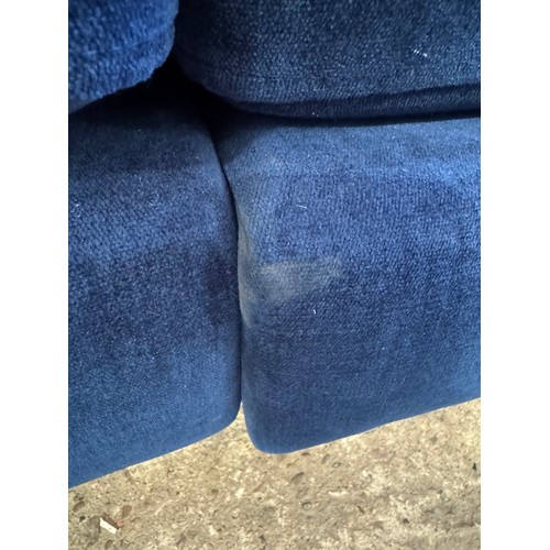 3024 - A navy blue pile velvet upholstered 4 seater sofa (marked)