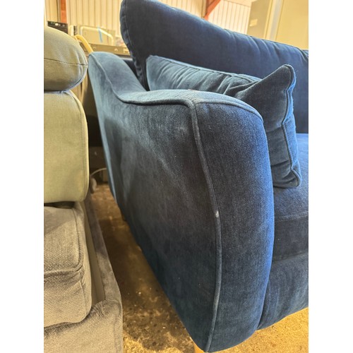 3024 - A navy blue pile velvet upholstered 4 seater sofa (marked)