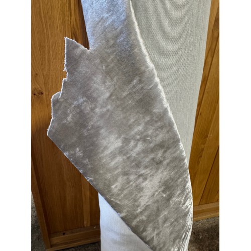 3035 - A silver roll of fabric (approx 30m)