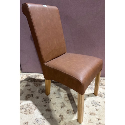 3041 - A tan leather baby rollback dining chair (QBABYROL) (CFL-316-17)