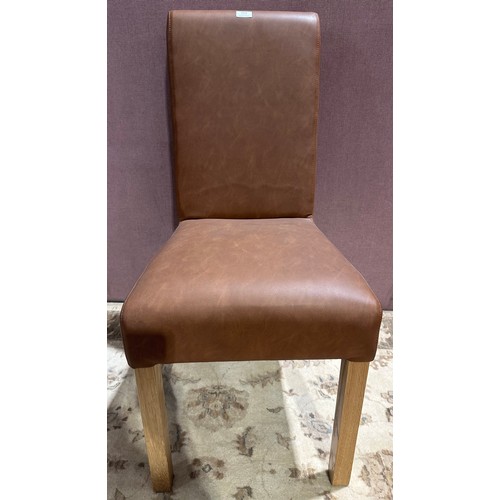 3041 - A tan leather baby rollback dining chair (QBABYROL) (CFL-316-17)
