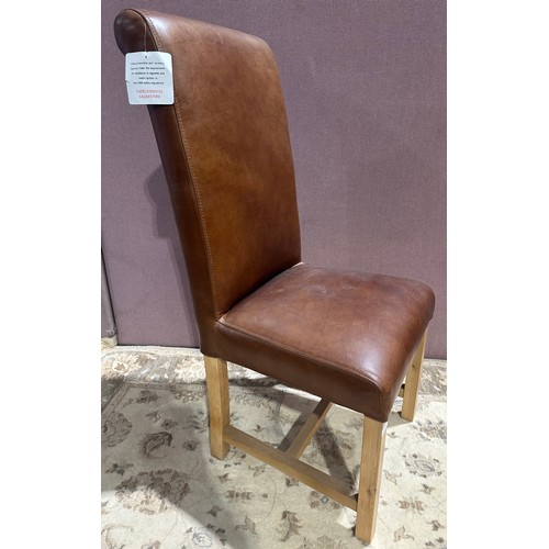 3042 - A tan leather rollback dining chair (Z_ROLTAL) (CFL-316-15)
