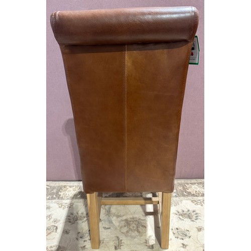 3042 - A tan leather rollback dining chair (Z_ROLTAL) (CFL-316-15)