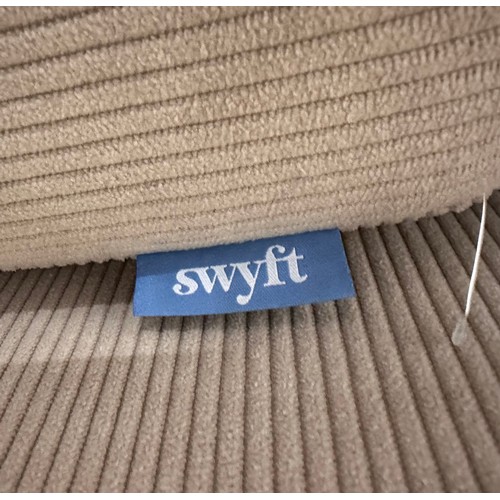 3048 - A Swyft model 08 cord sand armchair with fold out sofa bed RRP £1,499