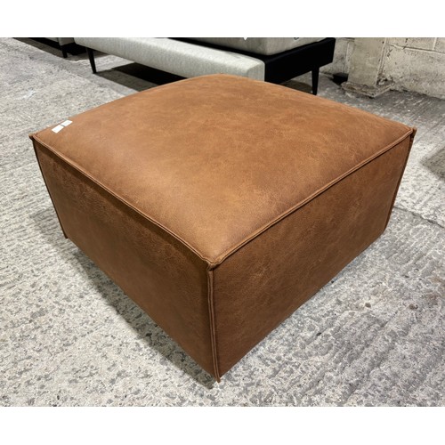 3050 - A Swyft model 03 chestnut faux leather ottoman, RRP £1,049