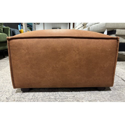 3050 - A Swyft model 03 chestnut faux leather ottoman, RRP £1,049