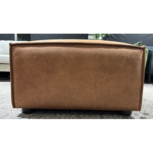 3050 - A Swyft model 03 chestnut faux leather ottoman, RRP £1,049