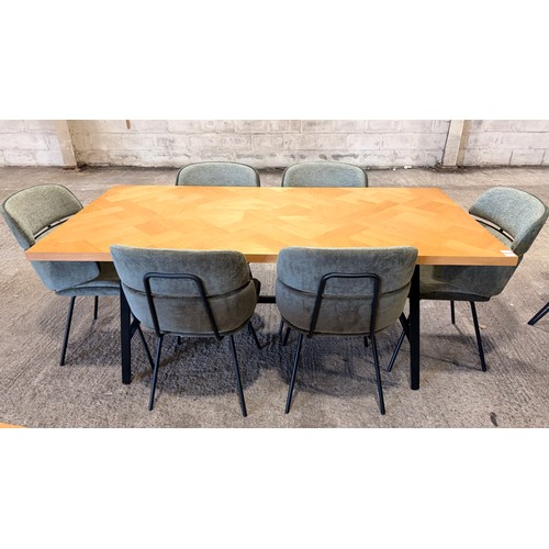 3067 - A parquet top oak table with six green, two tone chairs