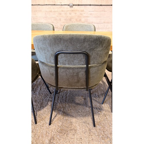 3067 - A parquet top oak table with six green, two tone chairs