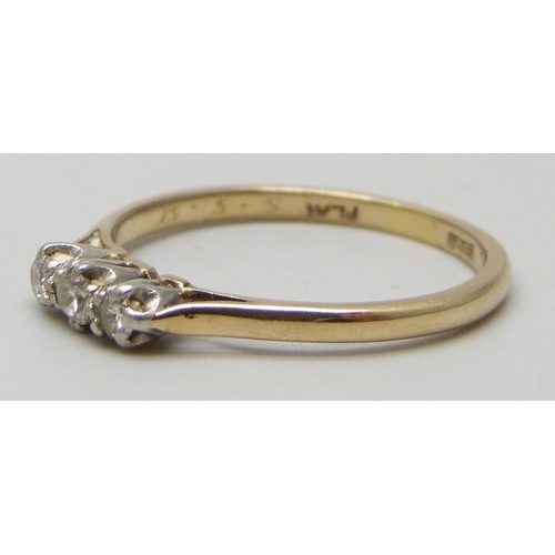 7016 - An 18ct gold and platinum three stone diamond ring, 1.6g, P