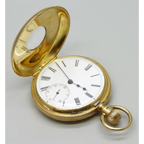 7210 - An 18ct gold half hunter pocket watch with engraved design and enamel numerals, hallmarks worn, pers... 