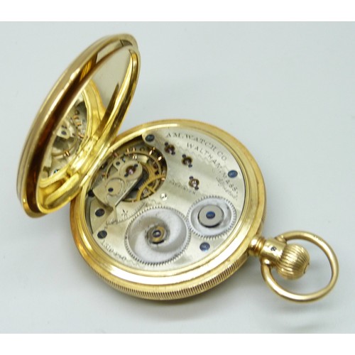 7210 - An 18ct gold half hunter pocket watch with engraved design and enamel numerals, hallmarks worn, pers... 