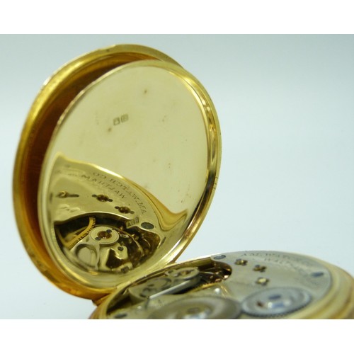 7210 - An 18ct gold half hunter pocket watch with engraved design and enamel numerals, hallmarks worn, pers... 