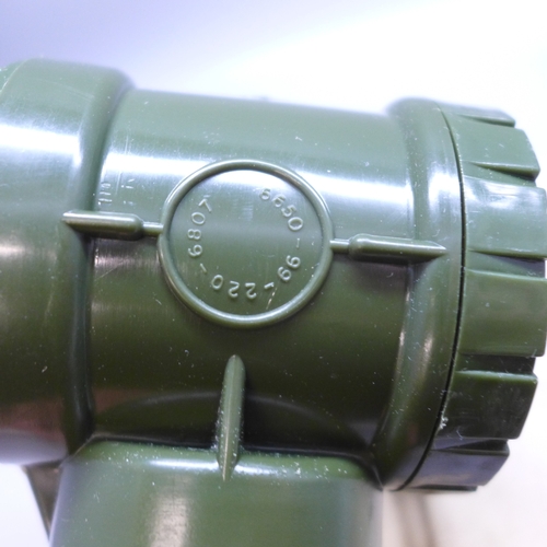 2017 - A telescope, marked Britannic, BC & Co. Ltd., made in England, a magnifier with light and an Air Min... 