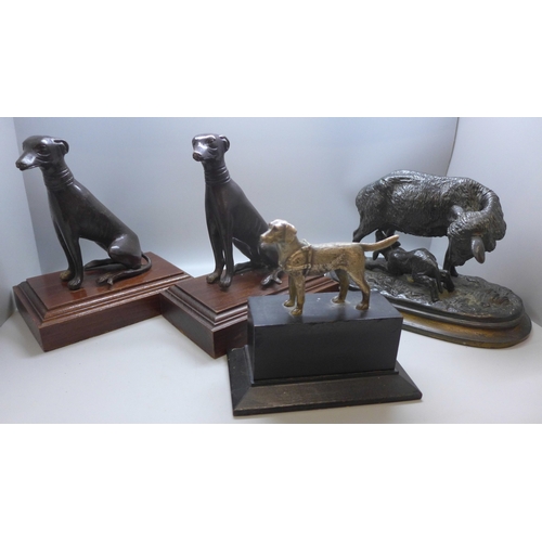 2042 - A pair of model greyhounds on wooden bases, a spelter sheep figure group and another model dog on ba... 
