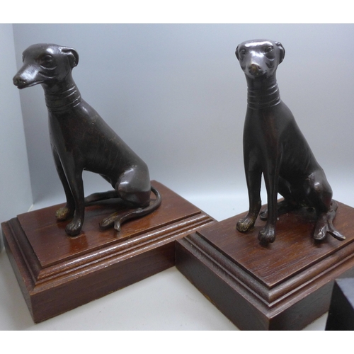 2042 - A pair of model greyhounds on wooden bases, a spelter sheep figure group and another model dog on ba... 