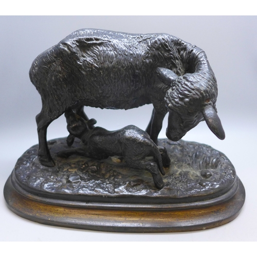 2042 - A pair of model greyhounds on wooden bases, a spelter sheep figure group and another model dog on ba... 