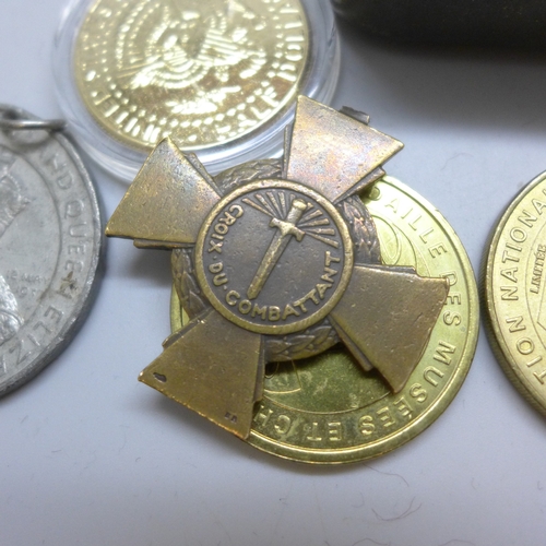 2214 - A Tom Long tin of mixed medals/medallions