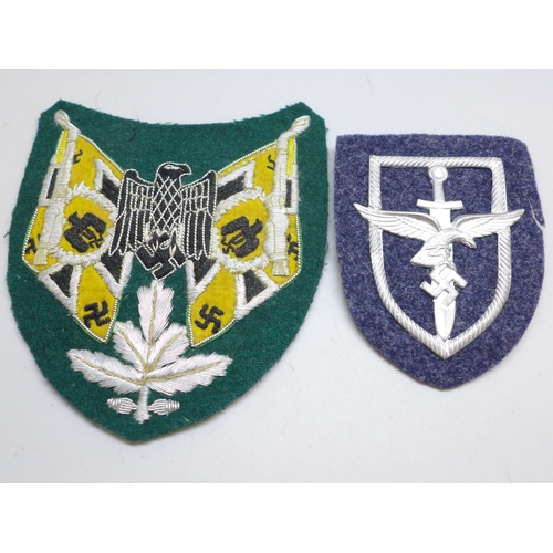 2225 - A German Women's Luftwaffe badge and a German flag bearers uniform patch