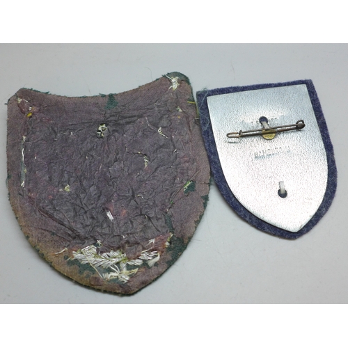 2225 - A German Women's Luftwaffe badge and a German flag bearers uniform patch