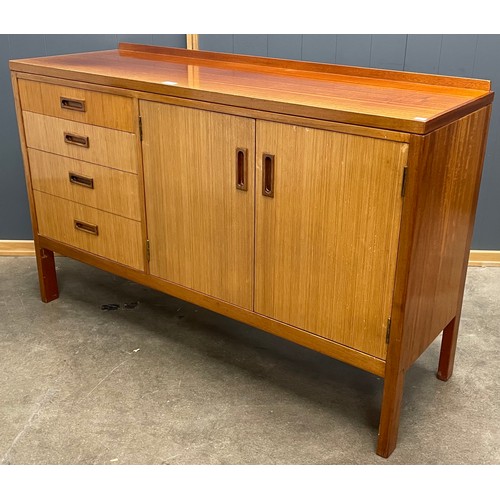 28 - A teak sideboard
