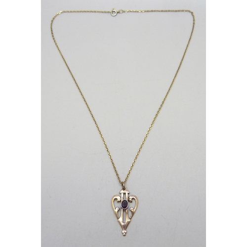 7010 - An Art Nouveau gold plated pendant on a gold plated chain, 3.2cm pendant including bail