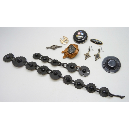 7018 - A collection of Victorian and later jewellery including a pair of pique earrings, and a mask brooch