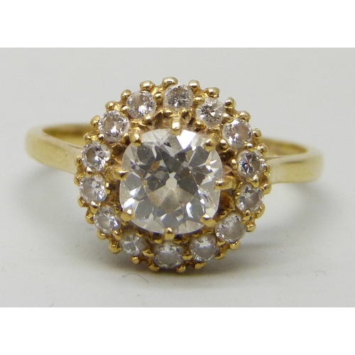 7027 - An 18ct gold old cut diamond cluster ring, estimated 1ct total diamond weight, 3.8g, Q