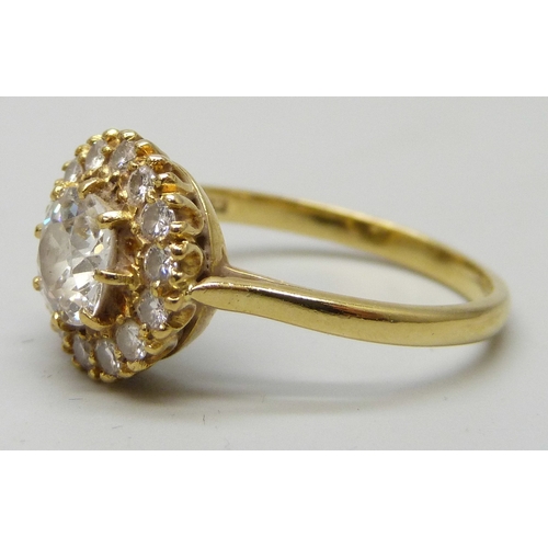 7027 - An 18ct gold old cut diamond cluster ring, estimated 1ct total diamond weight, 3.8g, Q