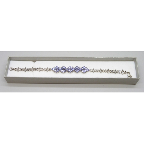 7047 - A silver set gemstone bracelet, possibly iolite, 13g, 20cm