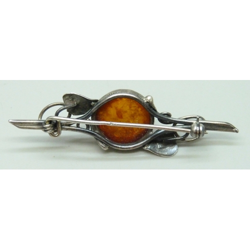 7052 - A Polish silver and Baltic amber Art Nouveau style bar brooch, maker's mark T.K, 6.5cm