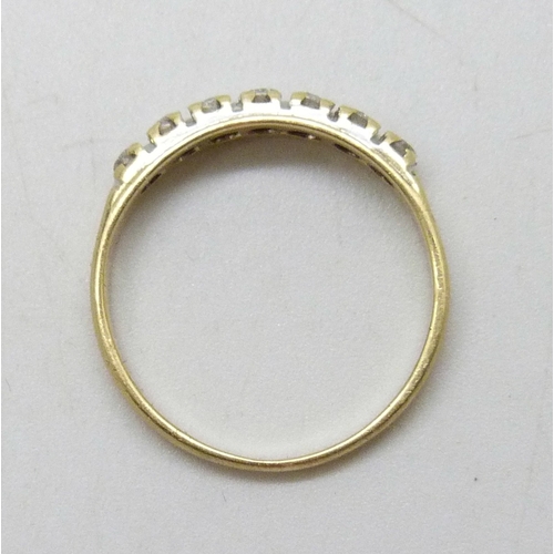 7064 - An 18ct gold and diamond ring, 2.1g, K