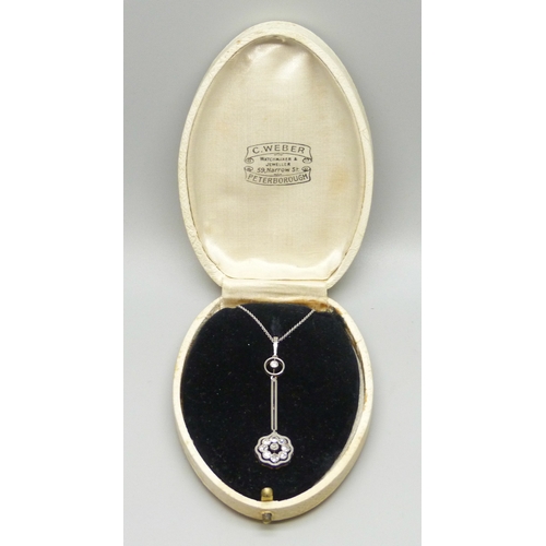 7079 - An Edwardian yellow metal diamond set cluster drop pendant, with white metal front, on a white metal... 