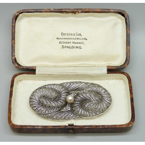 7087 - An Art Deco style silver and marcasite brooch, pearl with glue residue and some marcasite missing, L... 