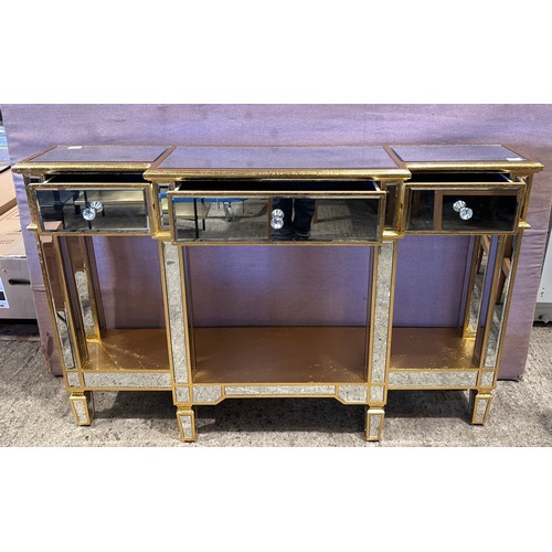 3088 - A gold and mirrored display console table