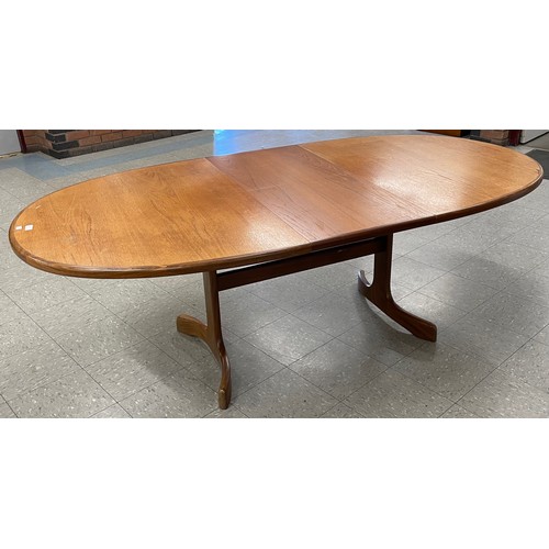 10 - A G-Plan Fresco teak oval extending dining table and and six chairs