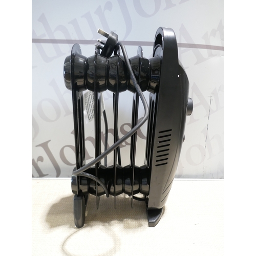 6045 - An Adobe mini oil filled radiator, Russell Hobbs plug in heater, Warmlite heater, Neilsen multi-purp... 