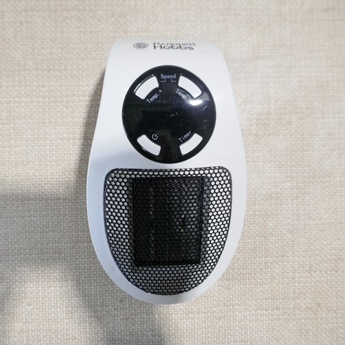 6045 - An Adobe mini oil filled radiator, Russell Hobbs plug in heater, Warmlite heater, Neilsen multi-purp... 