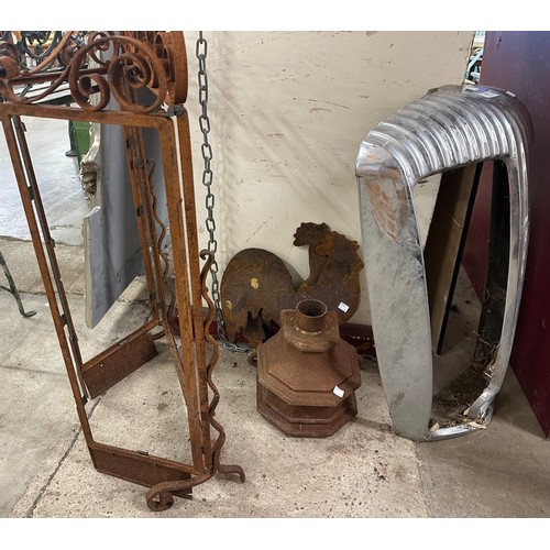 A radiator grill, cast iron drain hopper and two cast iron weather vane ...