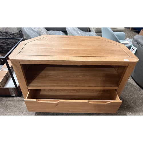 3027 - An Oak Furniture Copenhagen natural solid oak corner TV unit RRP £429 (Cracked foot)