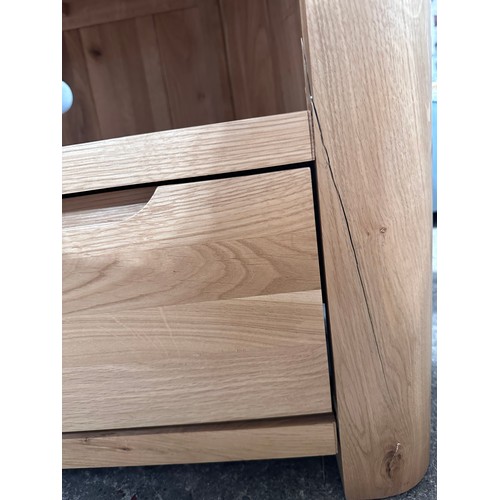 3027 - An Oak Furniture Copenhagen natural solid oak corner TV unit RRP £429 (Cracked foot)
