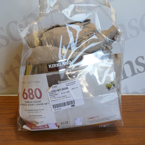 6036 - A Rem-Fit double waterproof fitted sheet and a quantity of Kirkland Signature double bedding, (384-3... 